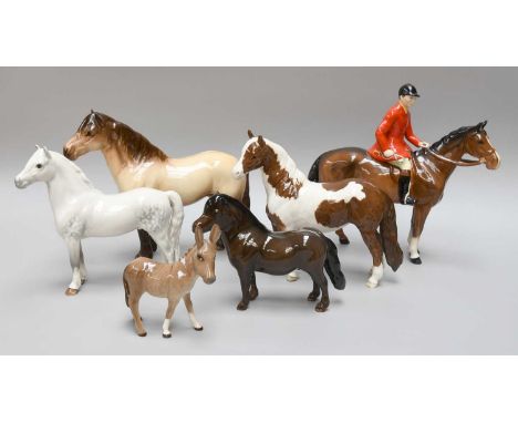 Beswick Horses and a Donkey Foal, including, Huntsman, Style Two - Standing, model No. 1501, brown gloss, Pinto Pony, skewbal