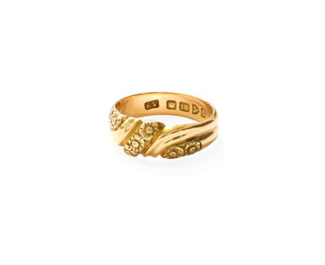 An 18 Carat Gold Ring, formed of two intertwined rows, one decorated with floral motifs, to a double row plain polished shank