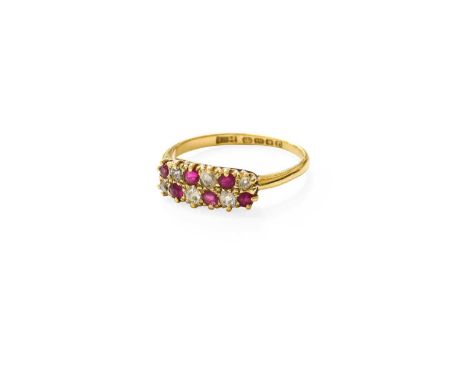 An 18 Carat Gold Ruby and Diamond Two Row Ring, old cut diamonds alternate with round cut rubies in yellow claw settings, to 