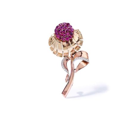 A retro ruby and diamond brooch, circa 1940 Modelled as a stylised flower, the stamen composed of a cluster of circular-cut r