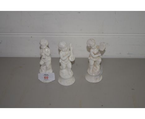 THREE SMALL WHITE GLAZED CERAMIC FIGURES
