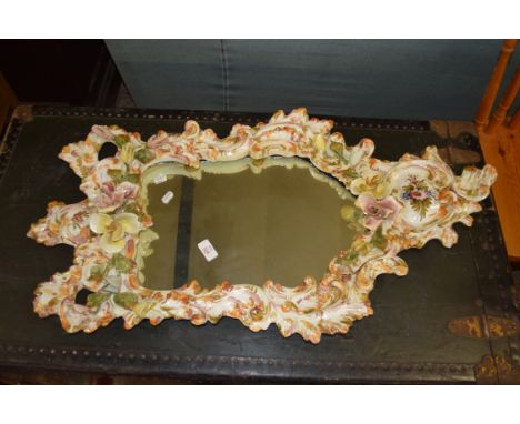 LARGE AND IMPRESSIVE HAND FINISHED CERAMIC FRAMED MIRROR WITH FLORAL DECORATION, MAX APPROX 87 X 48CM A/F