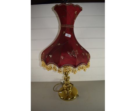 BRASS LAMP WITH RED EMBRIDERED SHADE