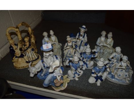 QUANTITY OF CERAMIC FIGURINES IN BLUE AND WHITE