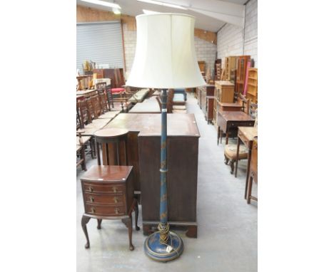 A Japanned lamp standard with a circular plinth base , blue ground c/w shade.