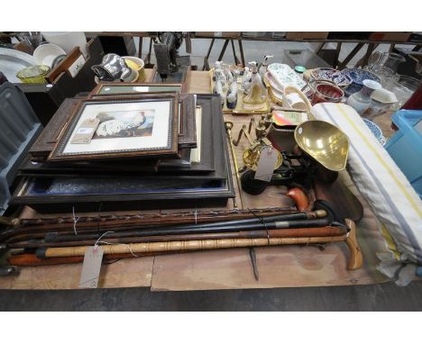 A Collection of pictures and prints, glazed counter top display case, 11 assorted walking sticks, kitchen scales and weights,