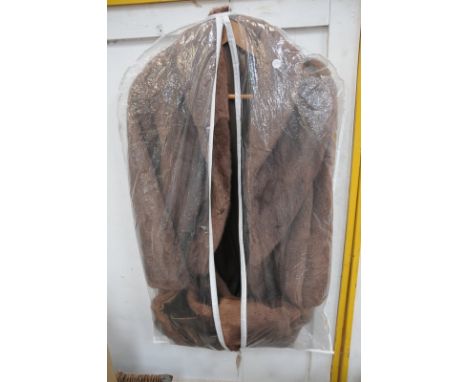A Ladies vintage three quarter length fur coat and a second similar coat. (2)