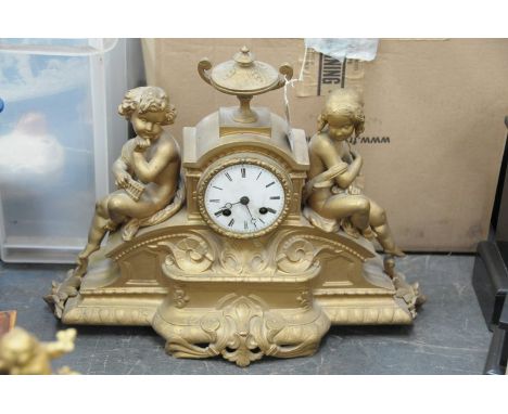 A 19th Century gilt spelter figural mantle clock
With a 8cm white enamel dial with Roman numerals, the two train eight day mo