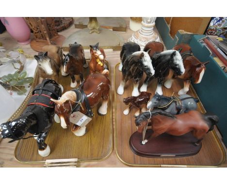 A Collection of ceramic horse figures including Royal Doulton " Spirit of freedom " , a Royal Doulton model of a bay shire an