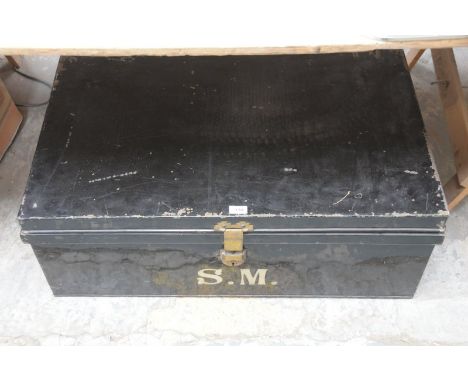 A Painted metal trunk with clasp fastener.