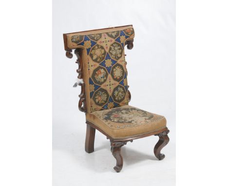 A William IV rosewood and Berlin work Prie-Dieu chair
With a cruciform padded tapestry back with scrolling terminals shaped p