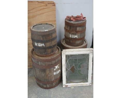 4 Vintage metal bound wooden barrels and two stained glass panels.