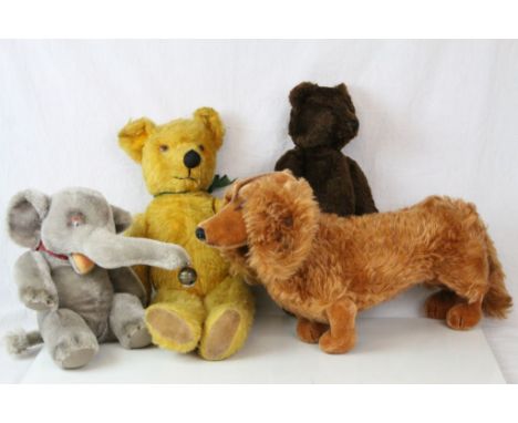 Four soft toys to include Steiff Jumbo The Elephant with original tag and bell to trunk, Straw filled Dachshund, straw filled