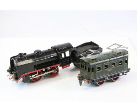 Two Marklin O gauge locomotives to include 20v electric  0-4-0 in black with tender and a RS3180 0-4-0 