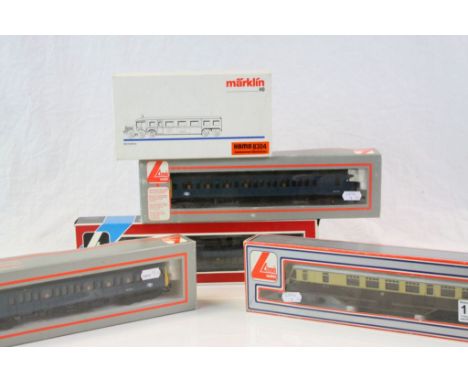 Boxed Marklin HO 8304 plus a boxed Lima OO gauge Railcar (damaged) and 3 x boxed Lima coaches (5)