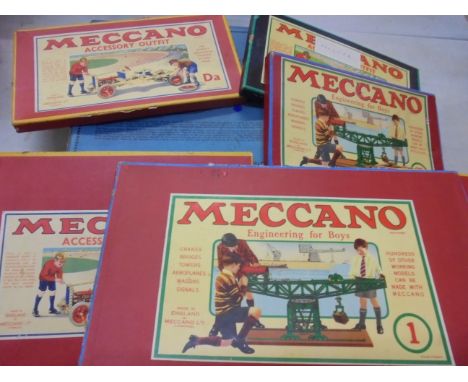Collection of vintage Meccano to include an Erector, geared roller bearing,quantity of manuals etc, contained within vintage 