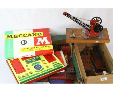 Collection of vintage Meccano to include Accessory Outfit No 6A, base plates, instruction manuals, pullies, wheels etc