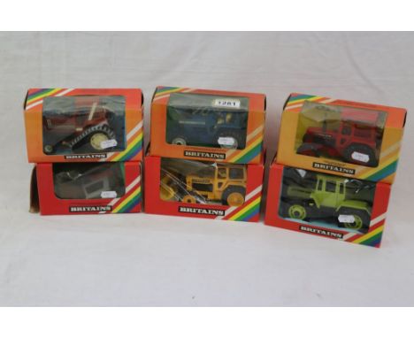 Six boxed 1:43 Britains models to include 9523 Ford TW20, 9527 Fiat Track, 9521 Volvo Tractor, 9529 Massey Ferguson, 9525 Mer