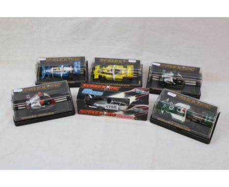 Six cased Scalextric slot cars to include C135 Elf Tyrrell 008, C281 Red Motorcycle Combination, C131 March Ford, C282 Green 