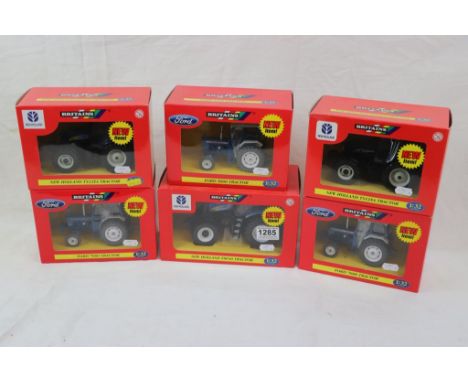 Six boxed 1:32 Britains tractor models to include 42112 New Holland T8040, 42197 Ford 7000, 42416 Ford 7600, 42196 Ford 5000,