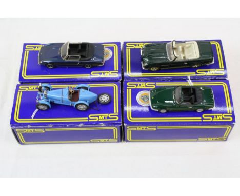 Four boxed 1:43 SMTS (Scale Model Technical Services) metal models to include CL30 Aston Martin DB6 Volante in green, RL 25 B