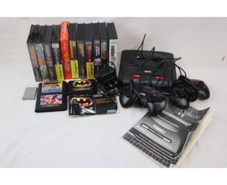 Retro Gaming - Sega Mega Drive console, 2 x controllers, manual, power cable and leads, 14 x games featuring cased Quackshot,