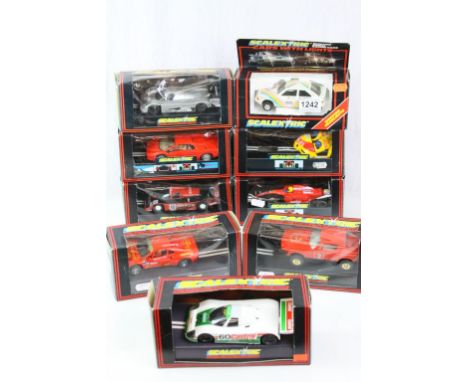 Nine boxed Scalextric slot cars to include C389 Ilford Photos XR3 with working headlights, C468 Sauber Mercedes, C485 Delara 