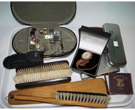 A leather jewellery box containing cufflinks; studs; etc.; 2 crowns; 2 Ben Sherman watches; a hip flask; brushes; etc.