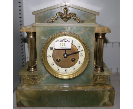 A French onyx and gilt mantel clock with striking drum movement