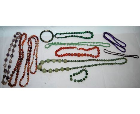 A selection of hardstone bead jewellery, amethyst; malachite and jade coloured
