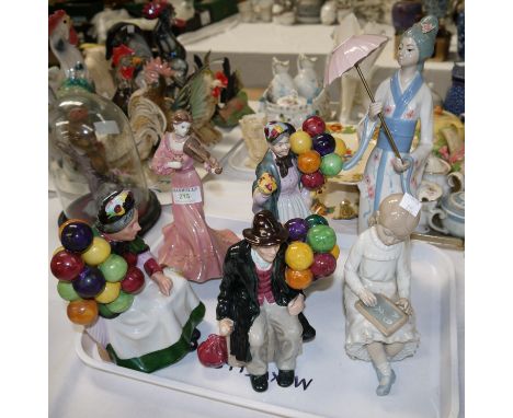 Three Royal Doulton style groups of balloon sellers; a Coalport figure:  female violin player; a Nao figure of a girl; a simi