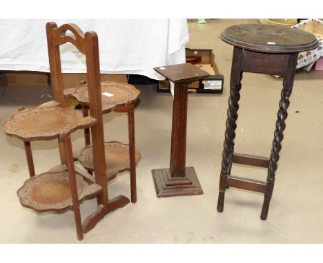 An oriental 4 height folding cake stand; an oak barley twist plant stand; a wrought iron tile top occasional table; etc.