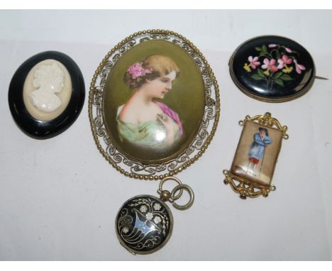 A large oval brooch set porcelain bust portrait; a pietra dura style brooch; 3 others