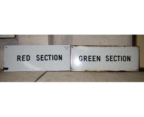 Two enamel tin signs:  "Red Section, Green Section"