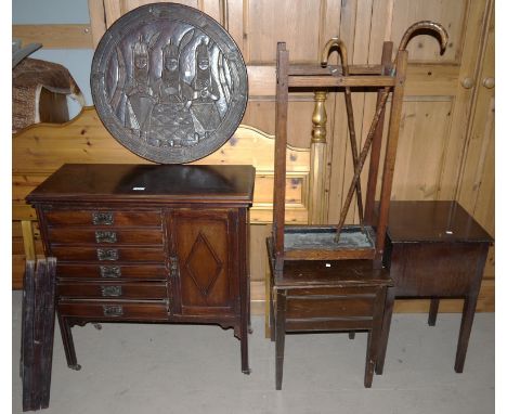 An African carved hardwood circular table with folding stand; a quantity of decorative items; An Edwardian stained wood music