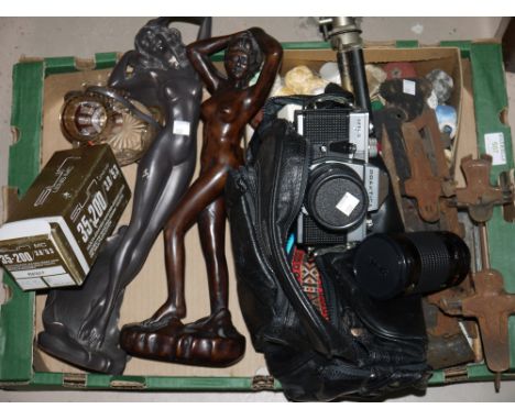 A Praktica camera; 2 bronzed effect figures; a collection of games and collectables