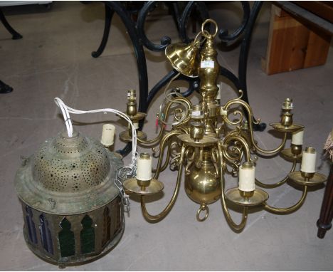 A Cromwellian style 12 branch centre light; a Middle Eastern lantern and brassware; 3 vintage tennis rackets; 2 19th century 
