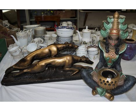 A 1930's bronzed plaster group of 2 greyhounds, impressed 'Bacci & Bacci' (minor chips to surface); a 1950's plaster table la