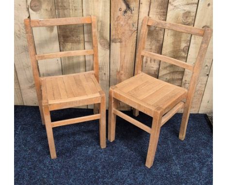 A Pair of children's light wood chairs