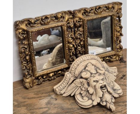 A Pair of small antique gilt plaster framed mirrors, together with an antique heavy plaster wall sconce shelf showing the Gre