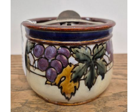 Royal Doulton Stoneware grape and vine pattern tobacco jar with lid. C1920's.