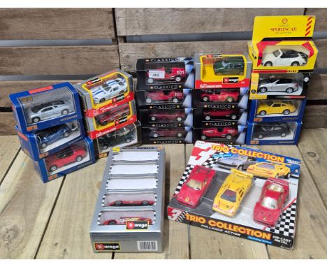 A crate of Burago &amp; Classico sport car models; Dodge Viper, porsche carrera, maisto jaguar &amp; many more