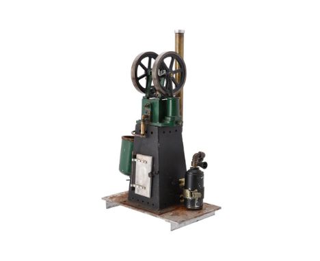 A gas fired hot air engine, having twin flywheels, open crank, water feed pump and water reservoir.From the collection of the