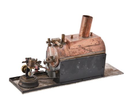 A copper horizontal model boat boiler and a small live steam boat engine, with fitted hand feed pump. Length 28cm. Width 9cm.