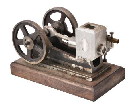 A well engineered model of a horizontal Internal combustion side rod stationary engine. Built by the late Mr Duncan Laidlaw o