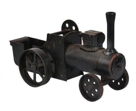 A cast-iron static model of a traction engine for display purposes. Length 78cm. Width 28cm. Height to top of chimney 47cm. F