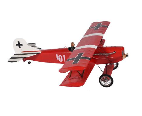 A model of a radio controlled German First World War Biplane, in Red Baron finish with single propeller and an internal combu