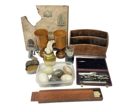 Pair of turned wooden goblets, six hardstone eggs, vintage slide rule and a leather letter rack, etc