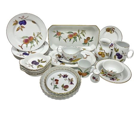 Royal Worcester Evesham pattern dinner wares, including flan dishes, sauce boat, jug, dinner plates, side plates, etc, 