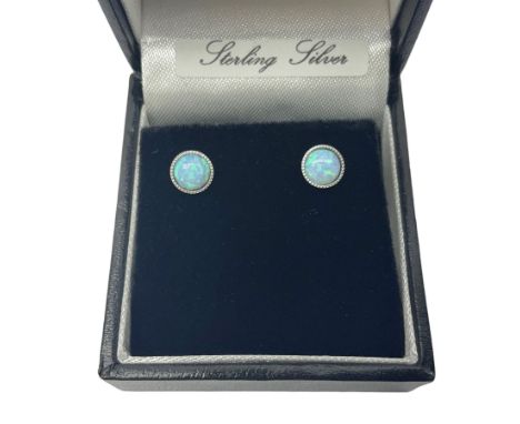 Pair of silver and opal stud earrings, boxed 